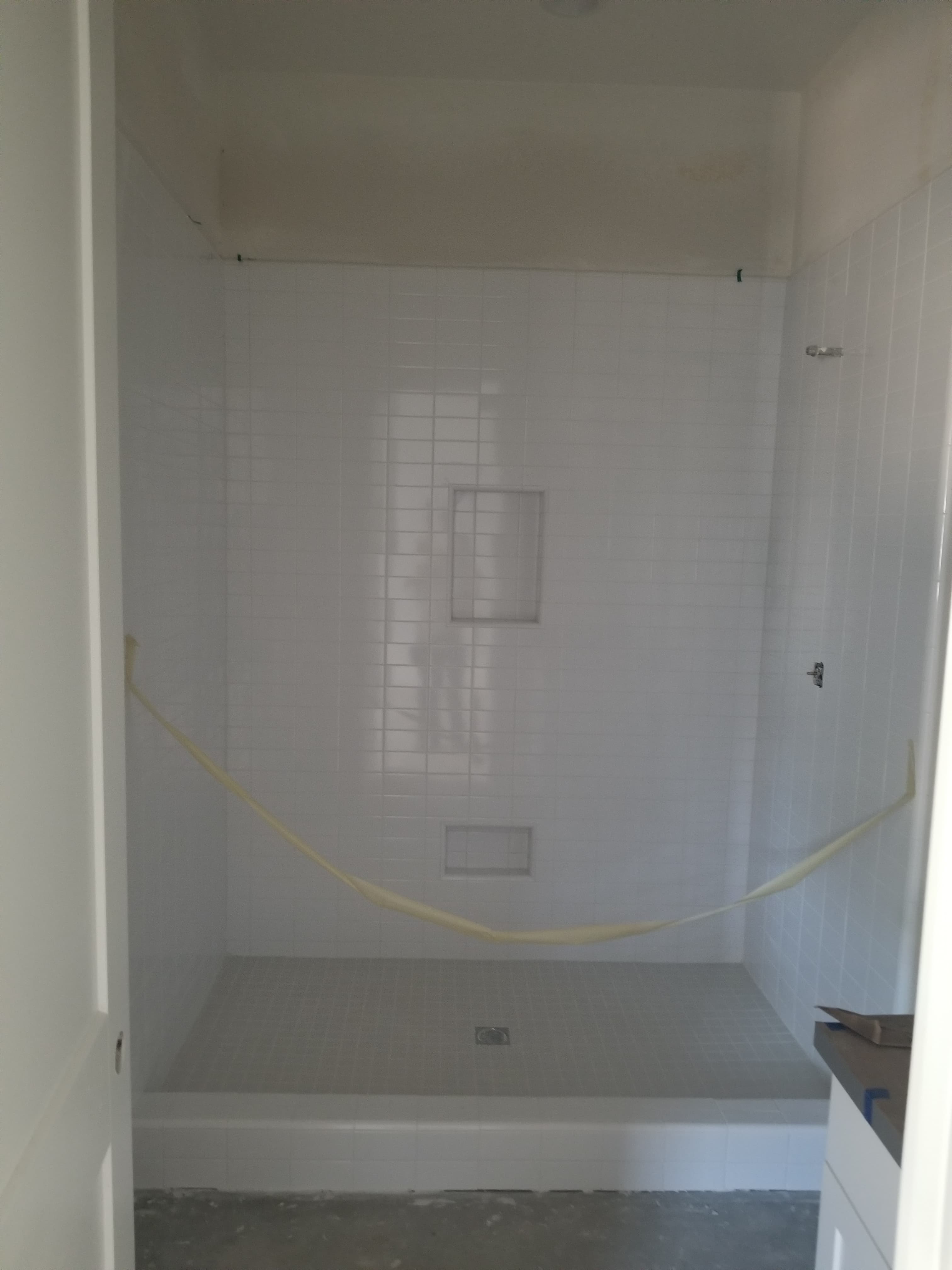 La Quinta shower interior in framing stage with waterproofing applied to backing