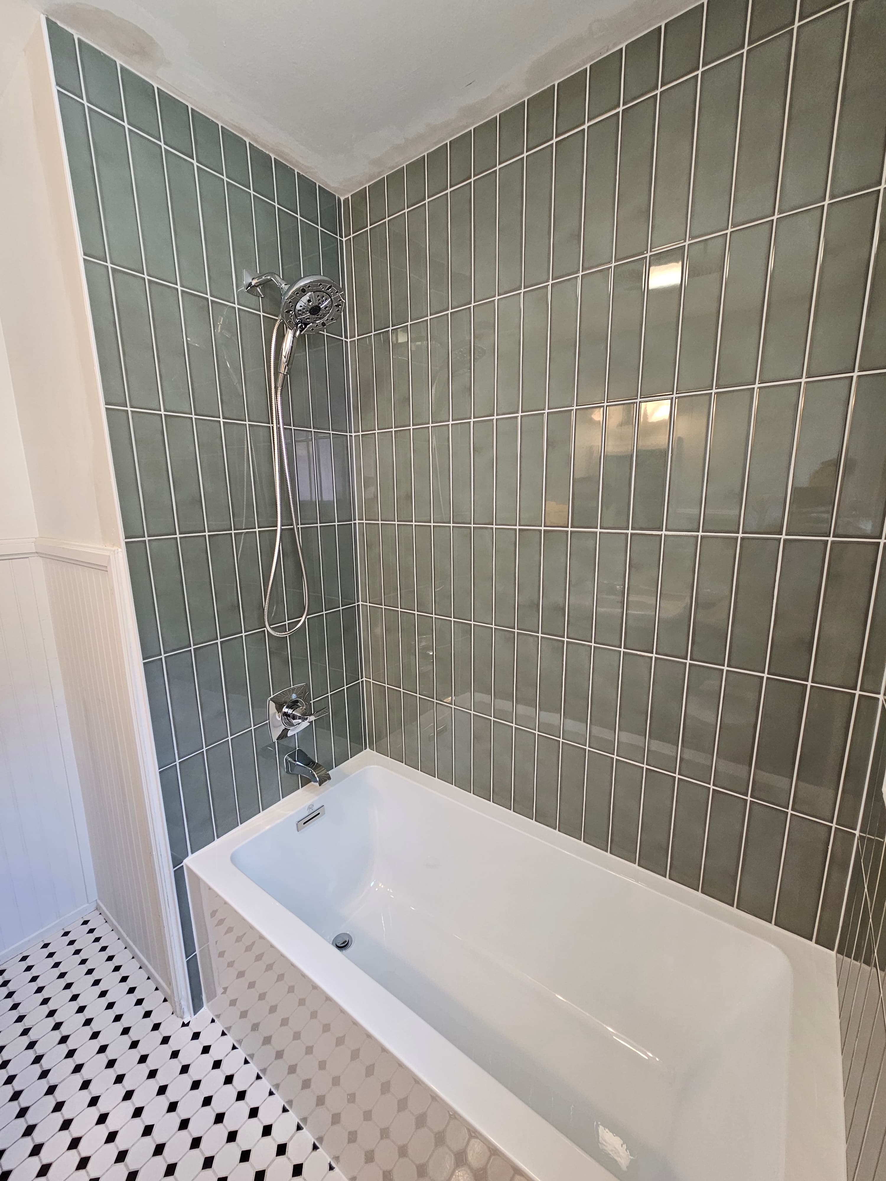 San Diego shower interior detail showing refined tile layout and luxury fixtures
